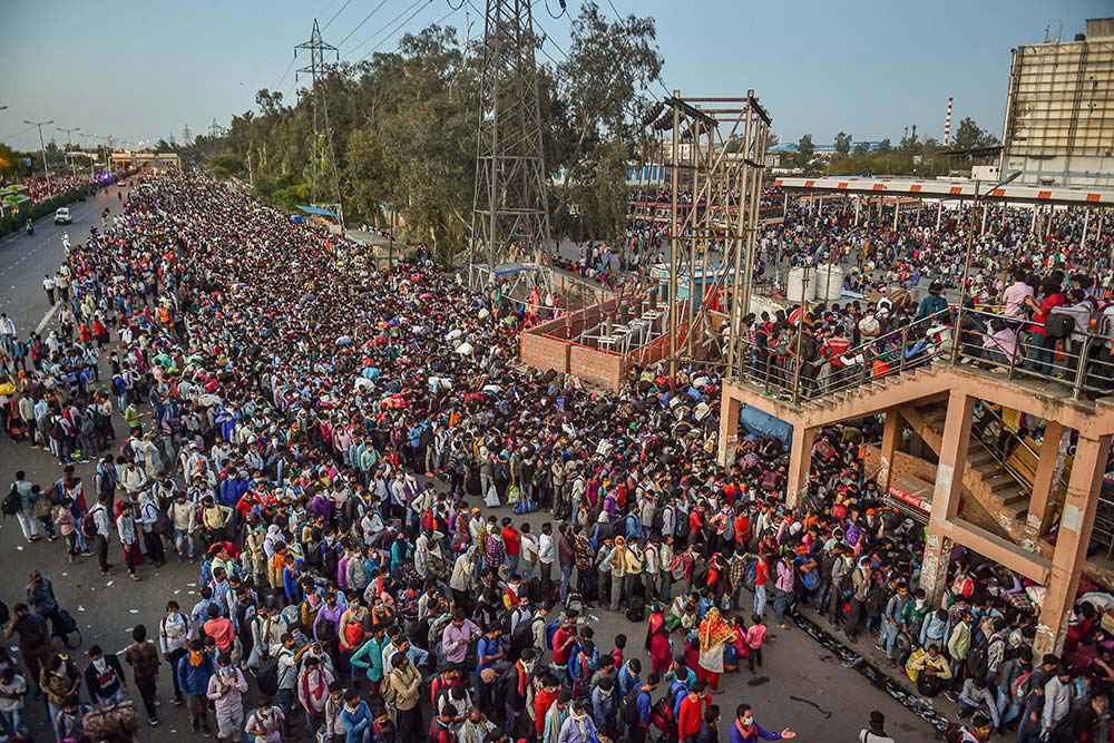 Hundreds of migrant workers—jobless, homeless and almost without cash and food—gathered outside a Bandra railway station in Mumbai following rumours that train services would resume on April 15.