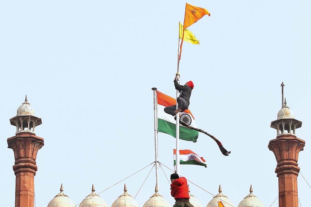 Protestors Fix Flags Atop The Ramparts